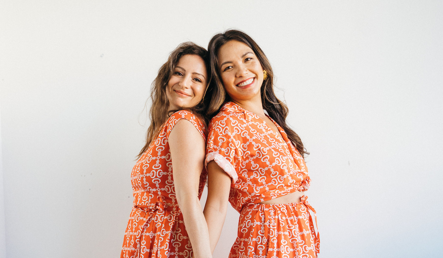 Nala Designs at The WYLD Shop Singapore: women modelling men’s shirt and classic dress in crepe ginger flower print