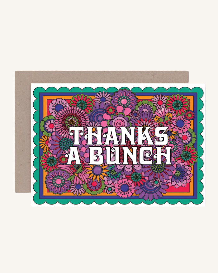 A colorful greeting card with a floral design and the text 'THANKS A BUNCH' in the center.