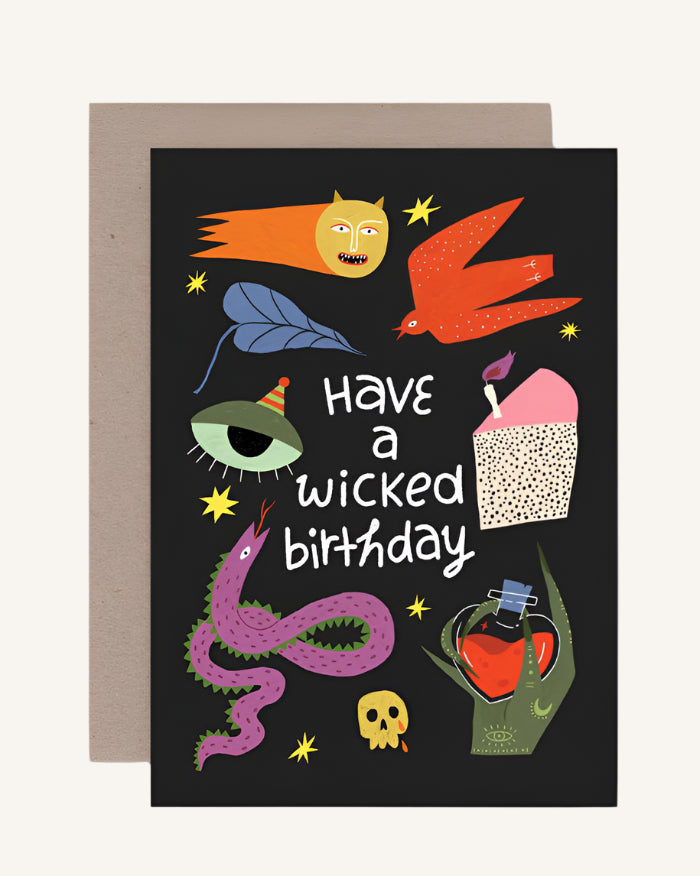 Greeting card with Halloween-themed illustrations and text 'Have a wicked birthday' on a black background.