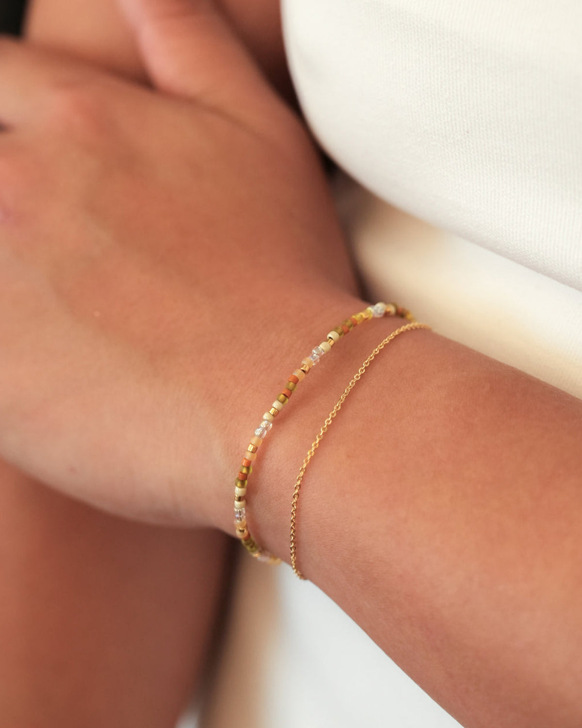 handmade Double Layered Bracelet – Harvest, featuring earthy-toned glass beads and a gold-plated chain