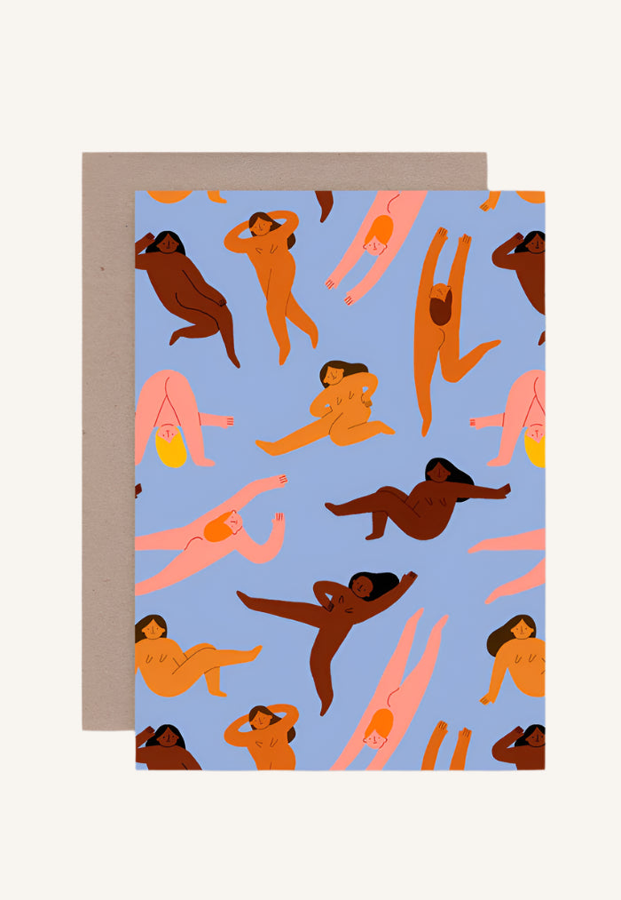 A colorful greeting card featuring a pattern of tiny, abstract, human-like figures in orange and brown on a blue background, with a brown kraft envelope.