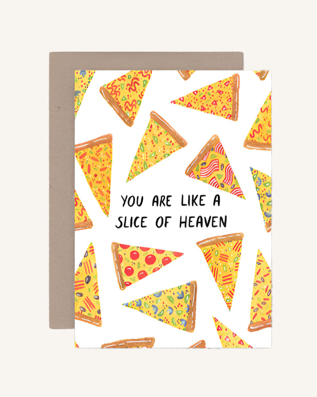 A greeting card with a pattern of pizza slices and the text 'YOU ARE LIKE A SLICE OF HEAVEN' across the center, presented with a brown envelope.